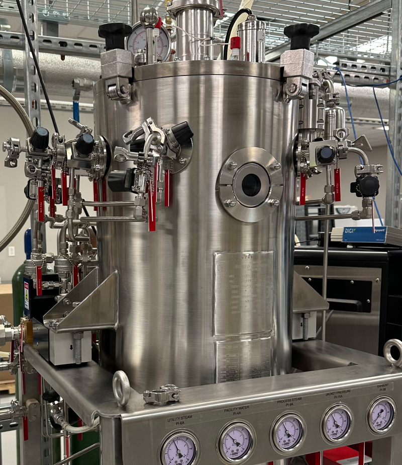 Detail view of the Eppendorf BioFlo 610 fermenter and its control system.